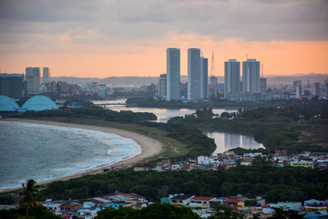 Aerial view of the historic city of Olinda in Pernambuco, Brazil at sunset contrasting with the...