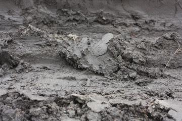 dirt and traces of tires after