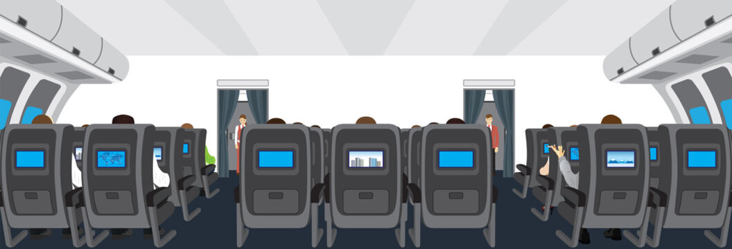Interior of salon of the plane. Passengers on the plane. 