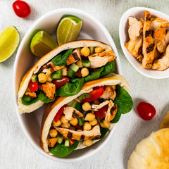 Mediterranean Grilled Chicken Salad with Chickpea or Garbanzo Beans. Selective focus.