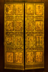 Golden door in an ancient Italian church.