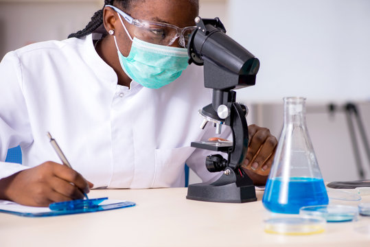 Young Black Chemist Working In The Lab 