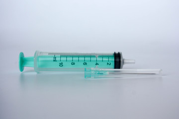 a medical syringe with a needle