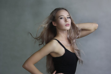 Naklejka premium attractive girl. sexy girl. developing hair