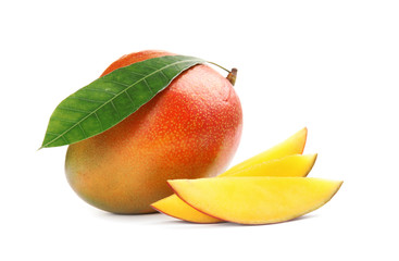 Delicious ripe mangoes on white background. Tropical fruit