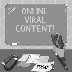 Text sign showing Online Viral Content. Conceptual photo Article that spreads rapidly online by website link Mounted Blank Color Blackboard with Chalk and Writing Tools Sheets on Desk