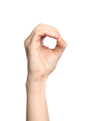 Woman showing O letter on white background, closeup. Sign language