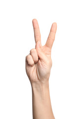 Woman showing V letter on white background, closeup. Sign language