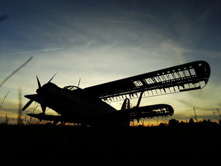 Abandoned Airplane at Sunset