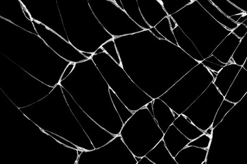 Art of wrinkles and cracks of glass caused by smashing and falling bumps. isolated on black background, This crack can be used as a pattern of floor tiles, in one corner also means loss and discord