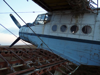Abandoned Airplane at Sunset