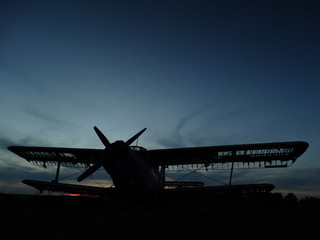 Abandoned Airplane at Sunset