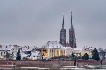 Wrocław covered in snow, a view of the Oder and Ostrów Tumski, winter panorama of Wroclaw with a...