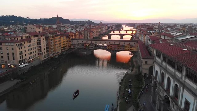 Colorful aerial sunset of Ponte Vecchio in Florence