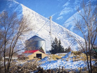Country barn and silo in the snow