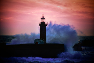 Faro lighthouse at sunset