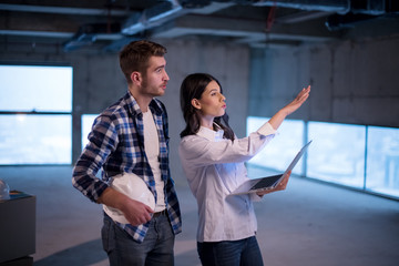 business people in group, architect and engineer on construction site