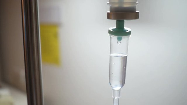 Little boy get sick from influenza need to be admitted to hospital with saline intravenous (iv)  in-line hand pressure