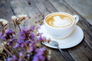 Coffee cup on table.