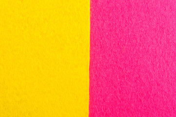 Yellow and pink sponges for dishes washing,