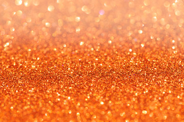Orange glitter bokeh