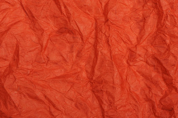Red crumpled paper for background
