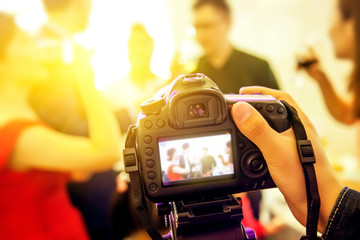 Record a video of the wedding scene with a SLR