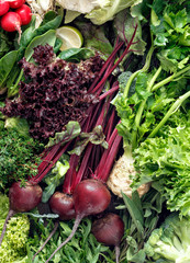 Healthy food ingredients background vegetables herbs top view