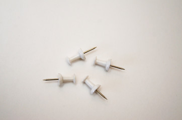 white buttons for pinning products to objects on the white background
