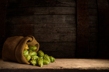 Still Life with a keg of beer and draft beer by the glass.