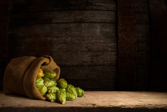 Still Life with a keg of beer and draft beer by the glass.