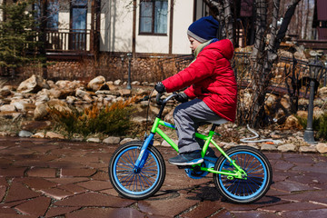 boy riding a two-wheeled Kids Bike