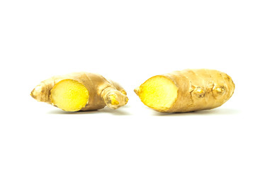 Ginger fresh isolated is a rooted plant with medicinal properties and is the elixir. with vitamins on white background and clipping path. The name of science : Zingiber officinale Roscoe