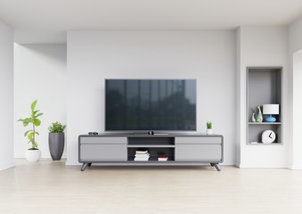Tv design on cabinet interior modern room with plants,shelf,lamp on white wall,3D rendering