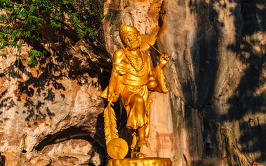 Golden statue of a Chinese god at the Tiger Cave Temple (Wat Tham Seua) in Krabi, Thailand