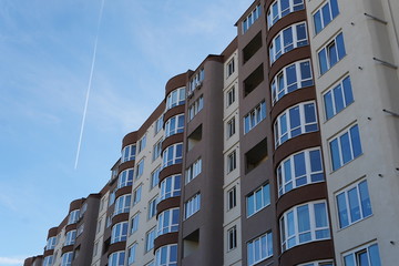 Modern condominium building real etate in city with blue sky