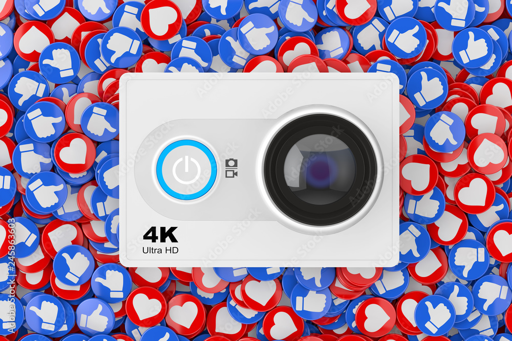 Poster small ultra hd action camera over heap of social media network love and like heart badges coins back