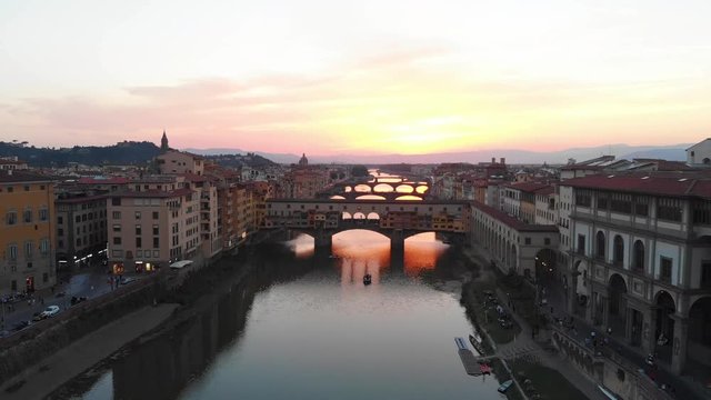 Wide Aerial of Colorful Sunset of Ponte Vecchio in Florence Italy