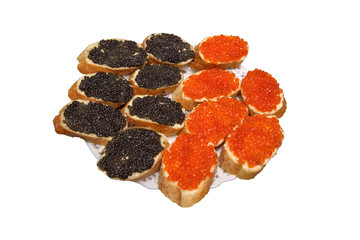 Sandwiches with black and red caviar, concept of wealth and well-being