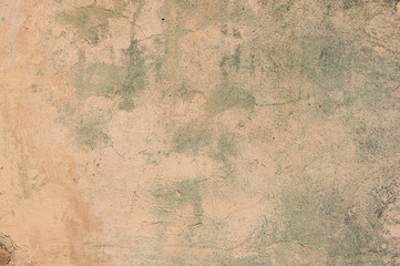Cracked and peeling paint old wall background.