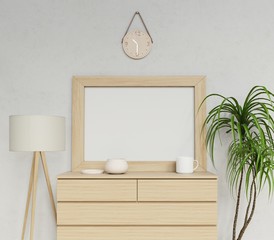 3d cozy contemporary interior rendering of blank a1 poster mock up template to showcase your design with horizontal frame sitting on modern wood drawer in straight front view