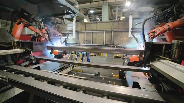Welding robot, the process of welding a metal profile.