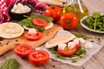 Tigella bread with spinach and tomatoes. 
