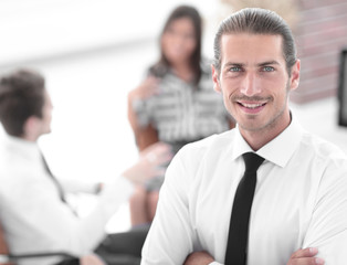 successful young business men on blurred background