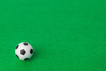 Soccer ball on football field