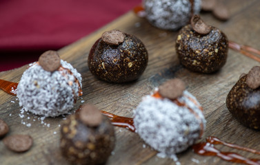 Healthy raw energy balls with cocoa, coconut, nuts