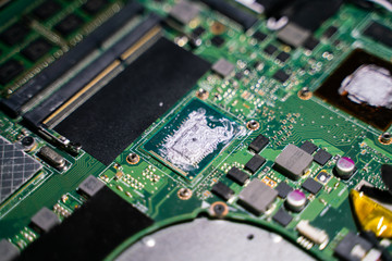 Abstract electronic circuit on computer mainboard close up