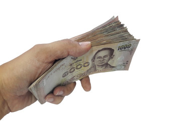 Hand holding a lot of 1,000 Baht Thailand banknote isolated on white background with clipping path