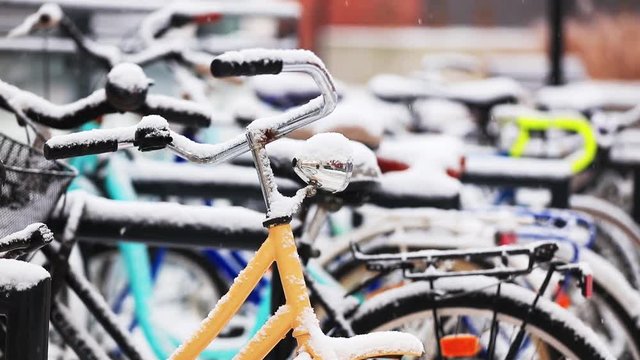 video of a vintage bike during a heavy snowfall in Europe
