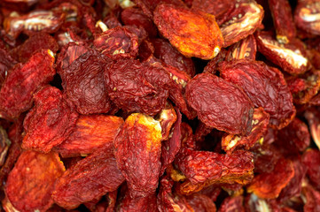 Background of dried red tomato. On the market of Turgusreis, Bodrum, Turkey. (corrected)